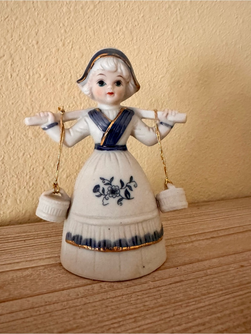 Porcelain Dutch Girl Bell Figurine in White and Blue with Gold Trim